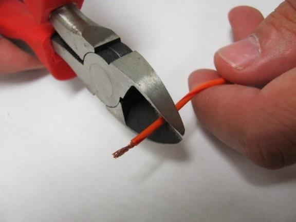 Option 2: Trim and Wrap Wire Required tools: Wire cutters Adhesive heat shrink tubing Heat source (heat gun or other) Procedure 1. Disconnect the battery terminals.