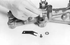 Check slave piston outside diameter ground surface for burs or defects. 7. Clean all parts with approved solvent and lubricate with engine oil. Figure 6-8 5. Insert piston in bore.