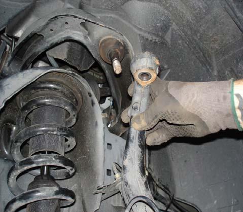 NOTE: The direction of the bolt for reinstallation. Lower Strut Hardware and Mount 6.