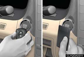 Starting the engine Card key* Depress the brake pedal. Touch the Lexus emblem side of the electronic key to the ENGINE START STOP switch.