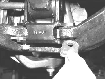 (it may be necessary to rotate the shock and extension to attach).