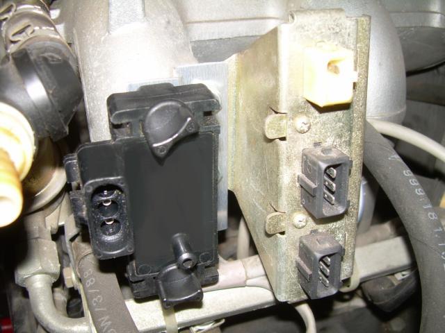 Install the MAP sensor bracket and tighten the two