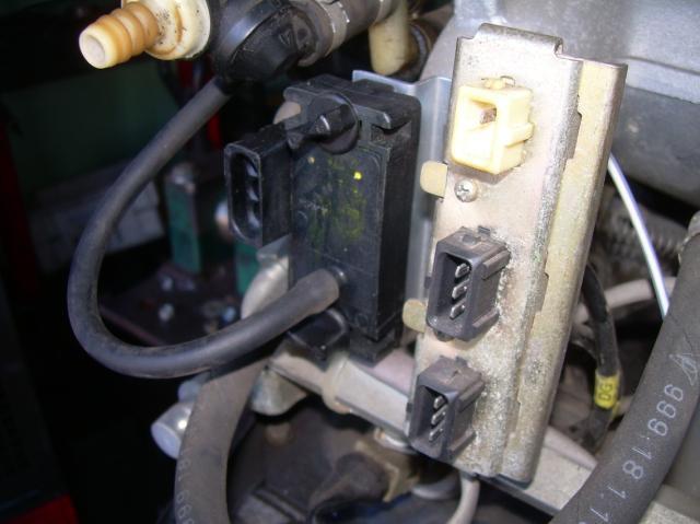 same place as the fuel pressure regulator (in the