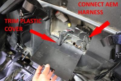 8 P/N 30-38 3) Connect the two ECU connectors to the AEM adapter harness inside the ECU compartment. Route the UEGO sensor connector through the hole, along the path of the OEM wire harness.