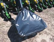 Hopper features double-brush system to prevent seed backfill.
