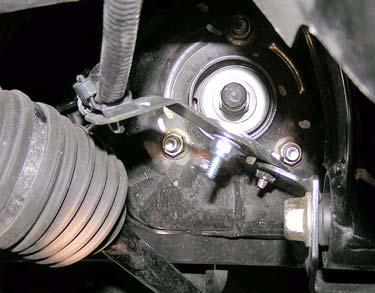 Failure to do so may cause steering malfunction, resulting in property damage or serious personal injury. a. Install kit extension (steering) into lower steering shaft.