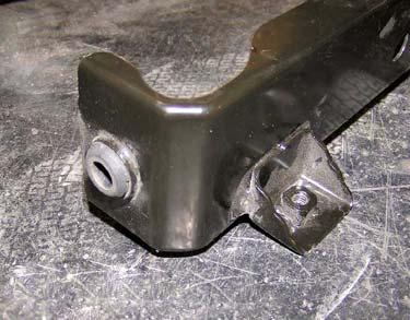 f. Remove rubber isolator from bracket and install onto large hole of kit spacer (2 x 3 x 1 ). Driver Side j.