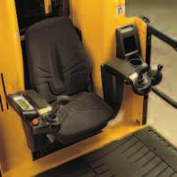 Seat-side joystick controls provide for simultaneous operation of truck functions.