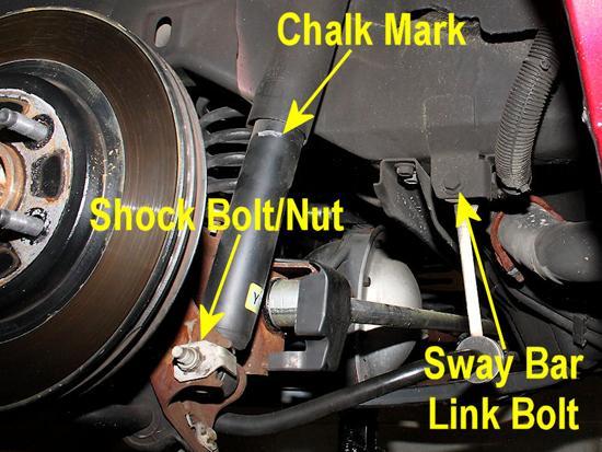 23. Before going further and lowering the rear axle, mark the shock with a piece of chalk where the two halves of the shock meet.