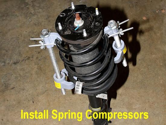12. Install your spring compressors, as shown in the directions that accompany them.