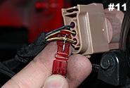 Felt electrical tape is wrapped around the bundle of wires that plug into the brown connector. Carefully un-wrap the tape several inches so you have better access to individual wires. 14.