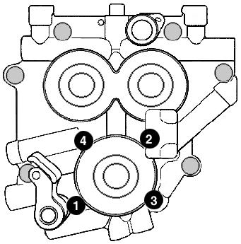 12. Following sequence shown in Figure 1, alternately loosen and remove oil pump bolts. 15. Remove the stock oil pump. Stock oil pump may be discarded. 16. Check pinion shaft runout.