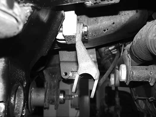 33. Install the provided passenger s side differential drop bracket to the original frame mount with two ½ x 2-3/4 bolts, nuts and ½ SAE washers. Leave hardware loose Figure 19.