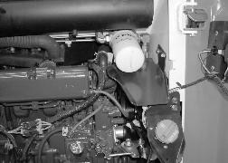 HYDRAULIC / HYDROSTATIC SYSTEM (CONT D) Removing And Replacing Hydraulic / Hydrostatic Filter For the correct service interval (See SERVICE SCHEDULE on Page 67). Open the rear door.