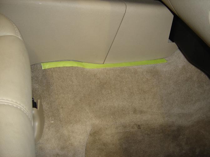 INSTALLATION DIFFICULTY: 3OUT OF 5 ESTIMATED TIME: 2-3 HOURS STEP 1 Using masking tape or similar, mark where the bottom edge of the front center console meets the carpet on the driver s side.