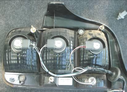 Installing Partial Plug-N-Play taillight harness: 1) Now transfer light bulbs from original wiring harness to the Meter4it Partial Plug-N-Play taillight harnesses (Driver and Passenger).