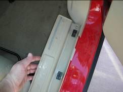 behind and to the scuff plate (threshold). 8) Remove the scuff plate (threshold) and continue Red power wire to passenger side kick panel.