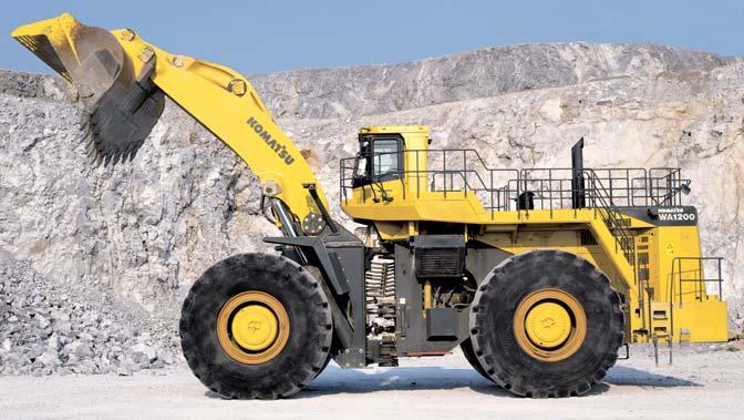 WA1200-3 W HEEL L OADER COST-REDUCING FEATURES Inherent to the Komatsu design are features which help mine operators reduce machine operational costs.