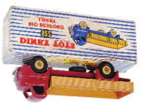 Dinky Toys, 905, Foden flat truck with chains, 2nd type cab, all maroon version with matching hubs, black tyres, in the original blue and white Supertoys box, some chipping (G-VG- BG) 120-180 1941