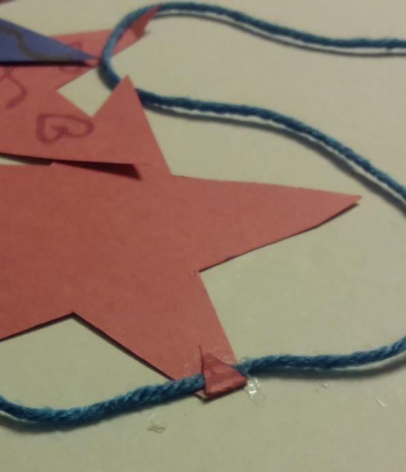 3. Glue the stars to the string by
