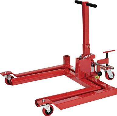 Safety chain provided to secure tires and wheels to the dolly. Maneuverability is made easy by means of two rear mounted ball bearing swivel casters.