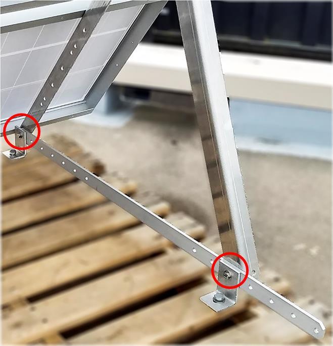 15. Complete the frame, by fastening the two flat bar pieces and mounting feet to the structural angles (see Figure 16 and Figure 17).
