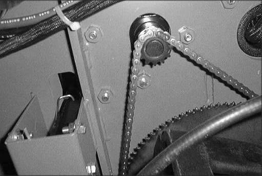 MAINTENANCE STEERING GEAR CHAIN (For machines below serial number 002363) The steering chain turns the front wheel as the steering wheel is turned.