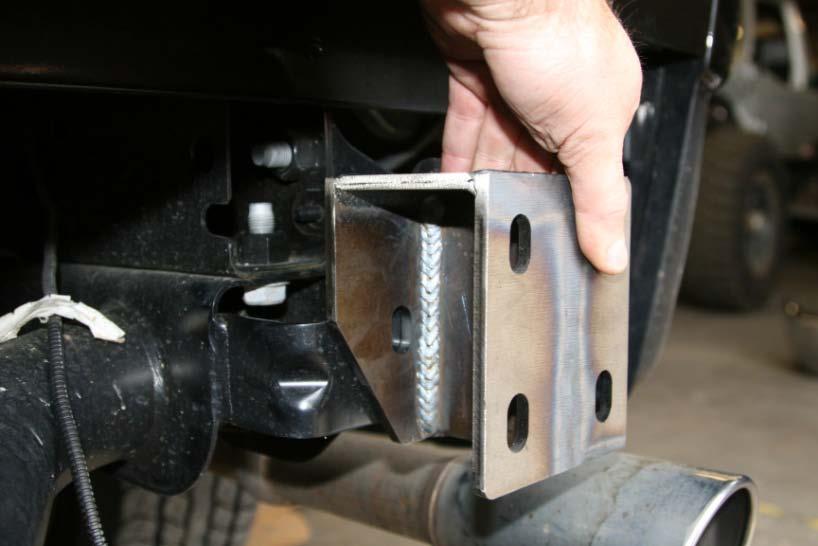F. Place the two supplied black.25 spacers onto the hitch as shown below. G.