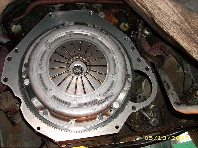 Intall the clutch plate, and then the clutch alignment tool.