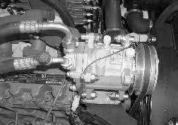 Check the air conditioning compressor belt deflection mid span of the belt between the crankshaft pulley and the
