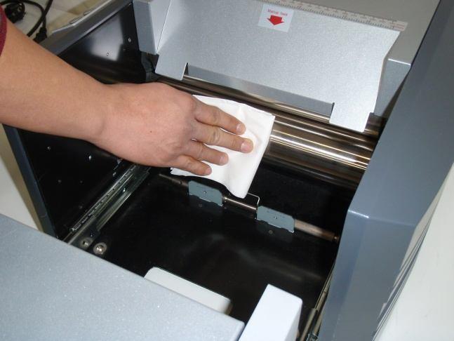4) Cleaning Press Rollers With general use, toner will build up on the Press rollers.