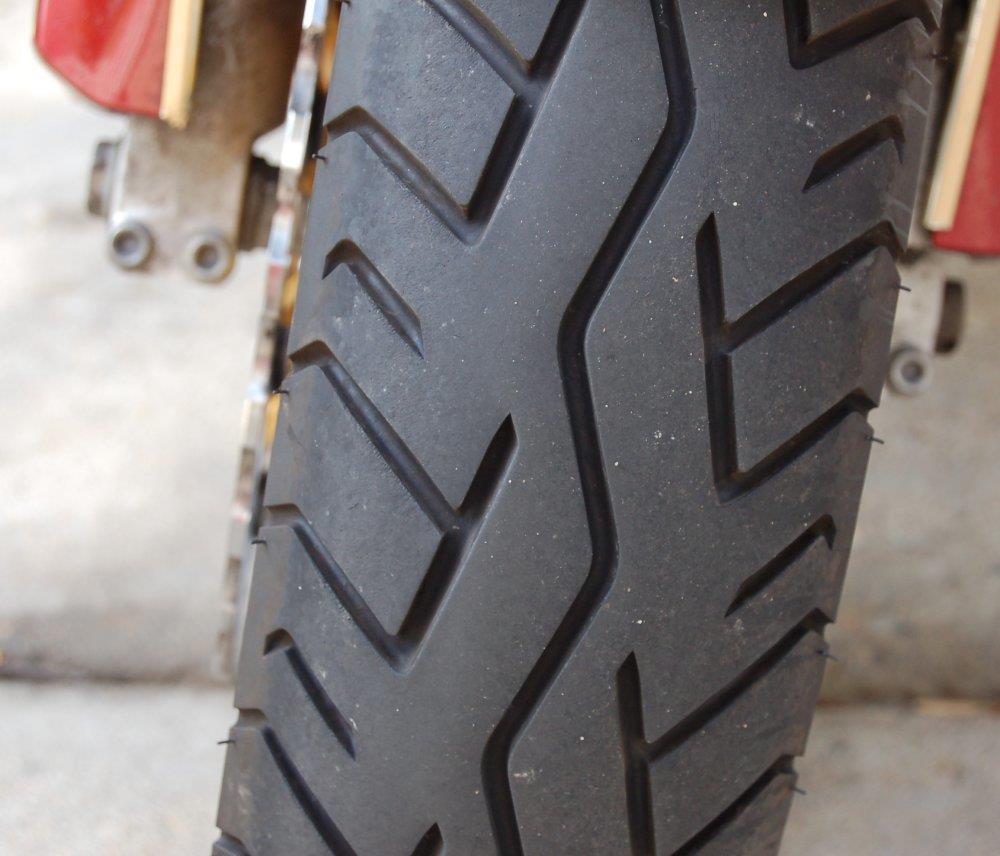 This is fairly common on the Bias tires, the mark them as front or rear but normally the rear tires work better on big bike rims.