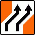the left. A supplementary distance plate is used for signs on level 2 and level 3 roads.