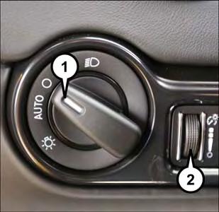 OPERATING YOUR VEHICLE HEADLIGHT SWITCH Automatic Headlights/Parking Lights/Headlights Rotate the headlight switch, located on the instrument panel to the left of the steering wheel, to the first