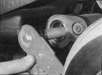 Using a soft-faced mallet, tap the bracket into position until the clearance between-the inside of the bracket and the trailing arm is 1. 0 mm; this can be checked using a feeler blade.
