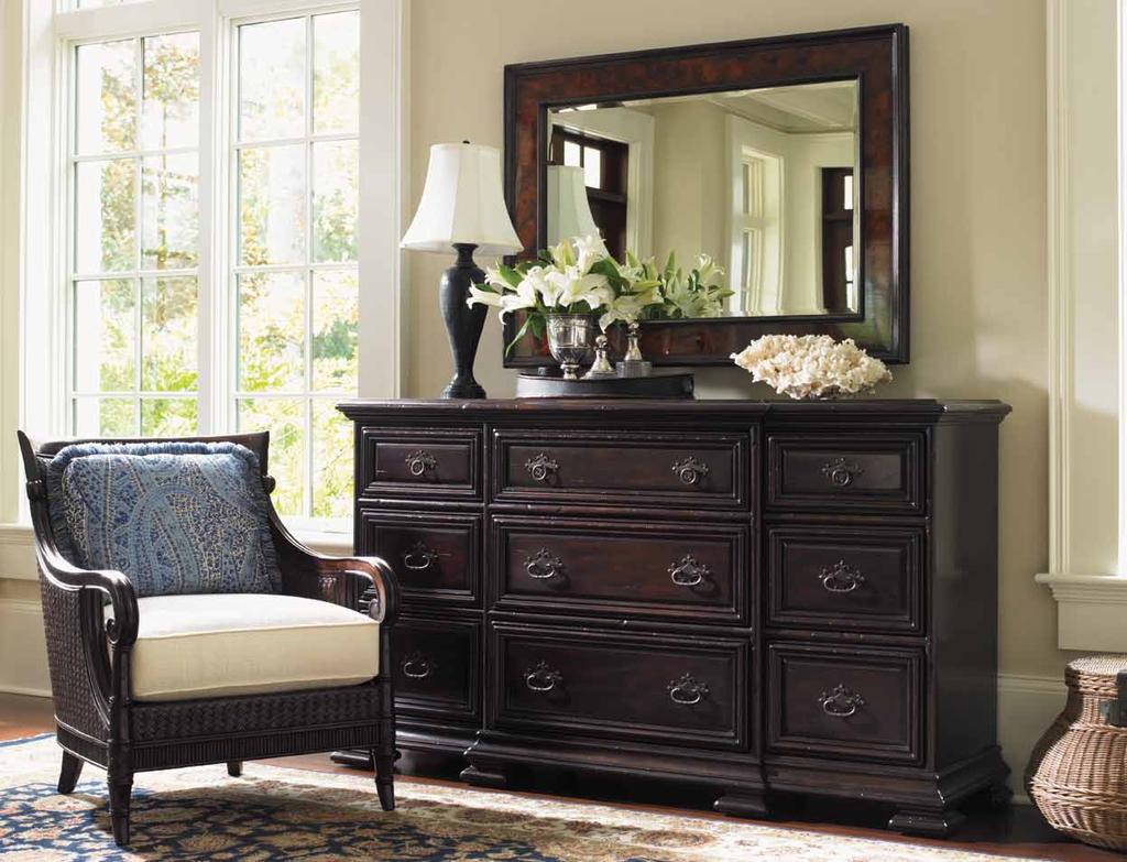 The 9- drawer Bexley triple dresser boasts a distinctive breakfront design on square bun feet.