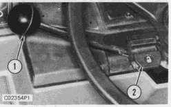 (4 Speed) 1. Place shift lever (1) into fourth gear. 2. Turn adjustment bolt (2) until it touches the shift lug (4). 3. Back bolt (2) out one turn and tighten locknut (3). (3 Speed) 1.