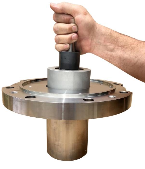 7. Thread on the impeller nut (Item 6). Lift the inner magnet assembly by the impeller nut and slowly slide it into the rear casing [Fig. 19].
