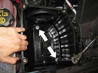 f. Install the foot grommet (784647) on the outside of the air box in the larger left front mounting hole as