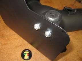 E. View of the M6 nuts (U) on the outside of the heat shield to mount the bracket. F.