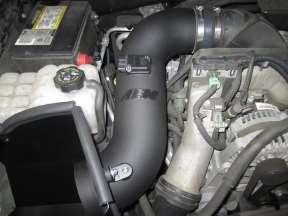 K. Install your AEM Cold Air Intake tube (A), first into the heat shield
