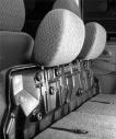 4. Store the head restraint in the top of the folded seat cushion. To raise the rear seat do the following: 1. Fold the rear seatback up.