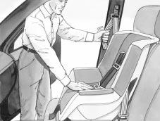 6. To tighten the belt, feed the shoulder belt back into the retractor while you push down on the child restraint.