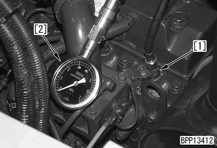 a See Adjusting valve clearance. 2. Warm up the engine until the engine oil temperature is 40 60 C. 6. Remove governor spring (2). 7.