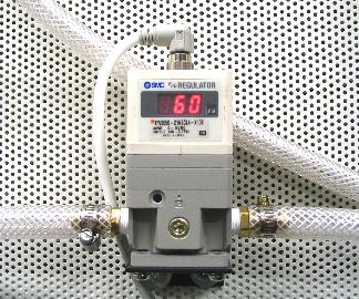 51 APPENDIX B SPECIFICATION OF ELECTRO-PNEUMATIC AIR REGULATOR Figure B.1 depicts the acquierd electro-pneumatic air regulator.