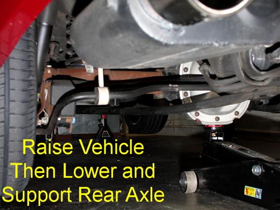 2. Next, you ll need to crawl under the car and remove the plastic cover that resides over the bolt