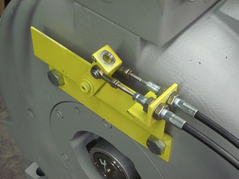 The manual brake release handle must be removed from the mounting plate prior to normal elevator operation.