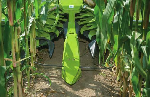 CLAAS AUTO PILOT. (optional) Two sensor skids each gauge two rows of corn. The signals generated by these sensors are translated into appropriate steering impulses.