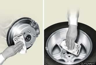 5-2. Steps to take in an emergency Installing the spare tire STEP 1 Remove any dirt