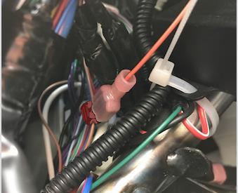 Then connect the orange/black wire from the in-dash switch harness to the red